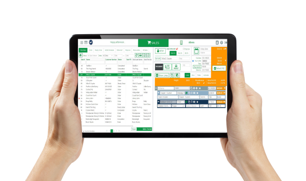 hands holding tablet with qpro on screen