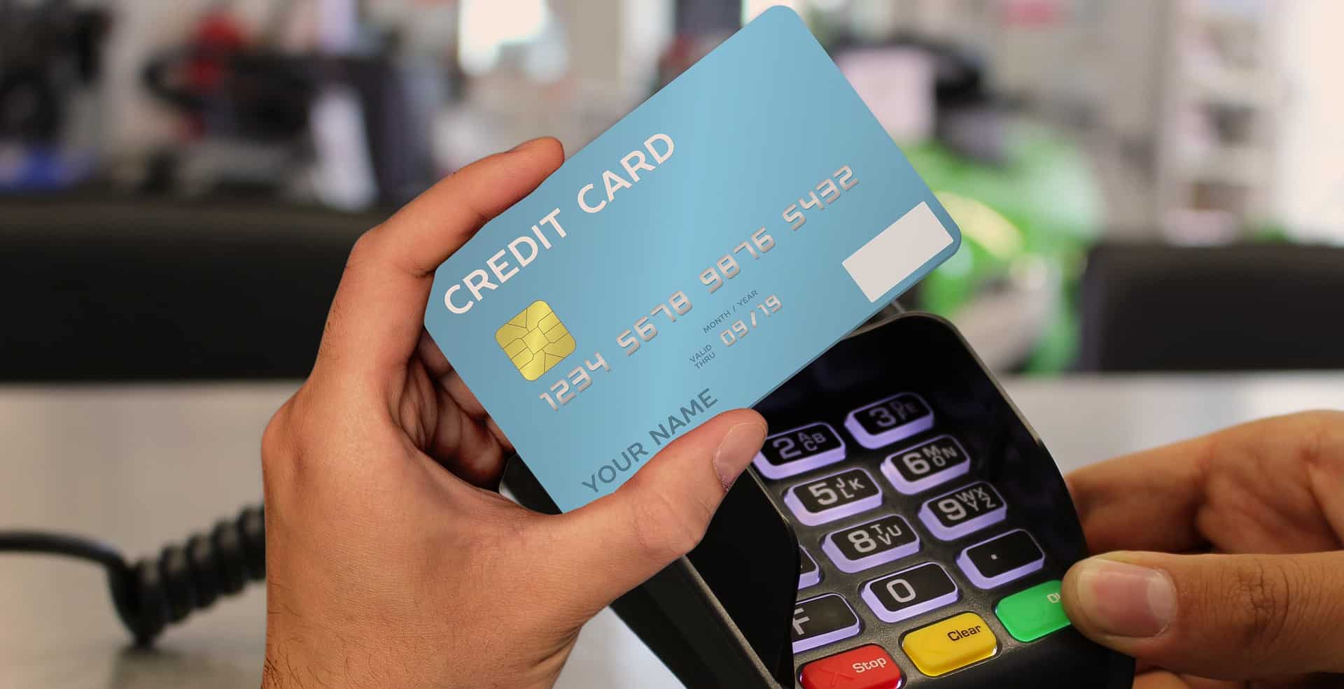 person using credit card machine